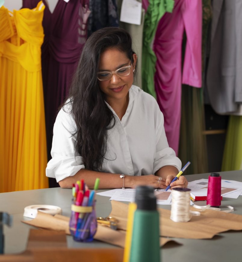front-view-brazilian-woman-working-as-clothing-designer